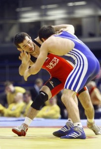 Russia's Djamal Otarsultanov wrestles against Bulgaria's Rizvan Gadzhiev during the final of the 55 kg category in the freestyle event at the Wrestling European Championships in Tampere